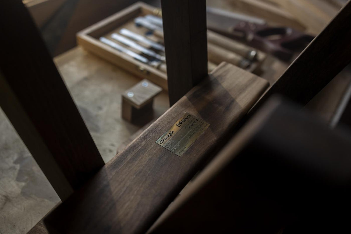 The makers' mark: the brass plate and the two signatures
